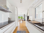 Einbauküche mit Elektrogeräten - SITULI: Exklusives Indoor-Outdoor-Living in Schwabing mit Dachterrasse und Loggia