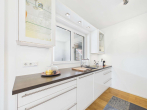 Einbauküche mit Elektrogeräten - SITULI: Exklusives Indoor-Outdoor-Living in Schwabing mit Dachterrasse und Loggia