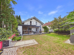Westansicht auf Terrasse - SITULI: Großzügiges Wohnen mit Garten, Outdoor-Kitchen und Einliegerwohnung