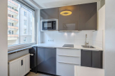 Einbauküche - SITULI: Schmuckstück im Herzogpark – 1-Zimmer-Apartment mit Balkon